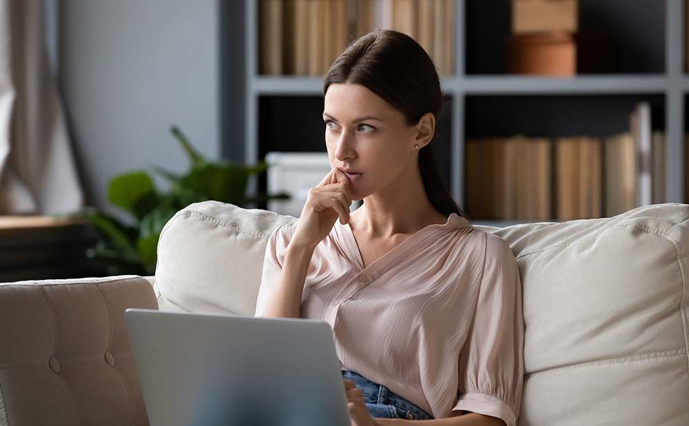 Woman asking questions about buying her first home through Homestead Financial