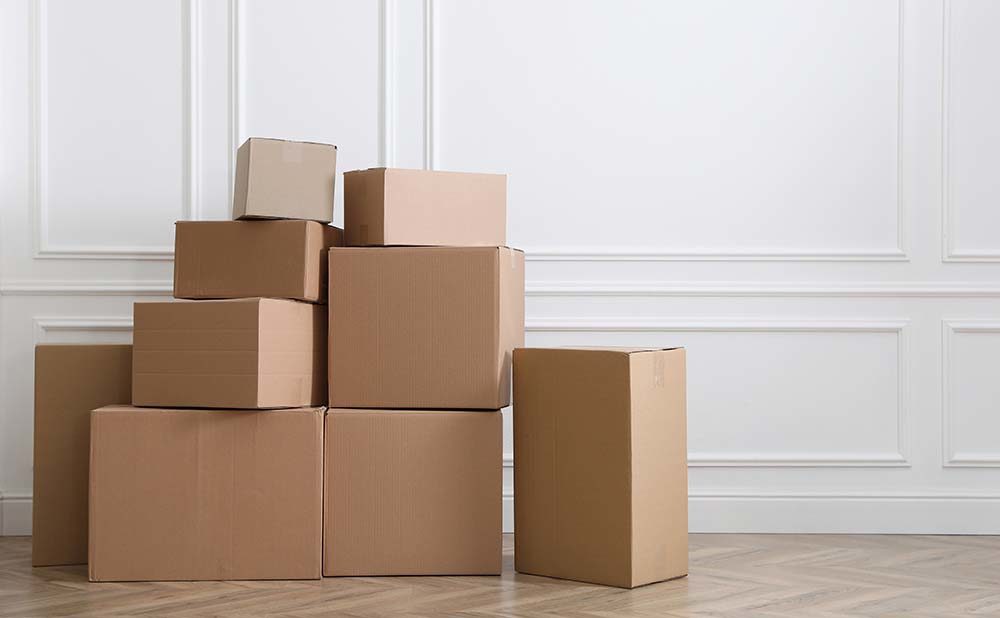 Stack of boxes in home after home sale through Homestead Financial