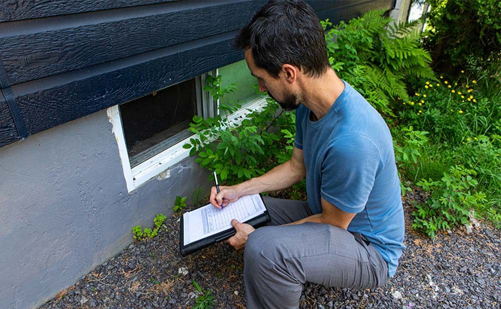 Man doing home inspection on home